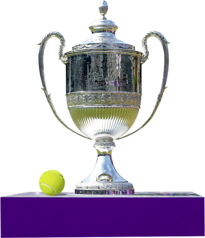 A trophy with a tennis ball on a plinth.
